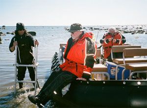 Exiting the boat on Hudson Bay after swimming with beluga whales. Exiting the boat on Hudson Bay after swimming with beluga whales.