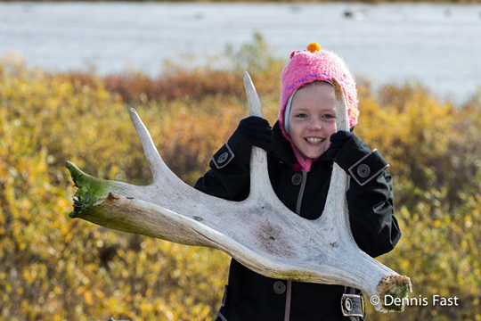 Girl with moose antlers at Nanuk Polar Bear Lodge. Girl with moose antlers at Nanuk Polar Bear Lodge.
