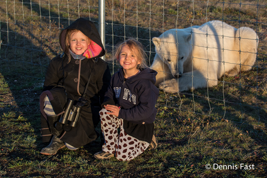 Polar bear with girls at Nanuk Polar Bear Lodge. Polar bear with girls at Nanuk Polar Bear Lodge.